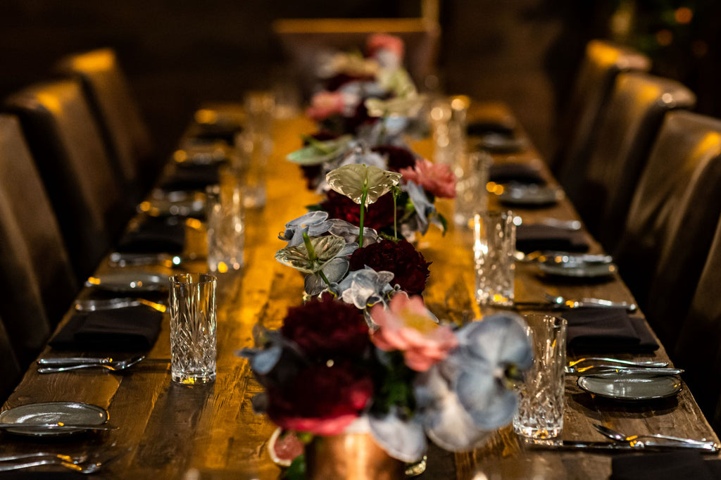 closeup of colorful centerpieces down the table