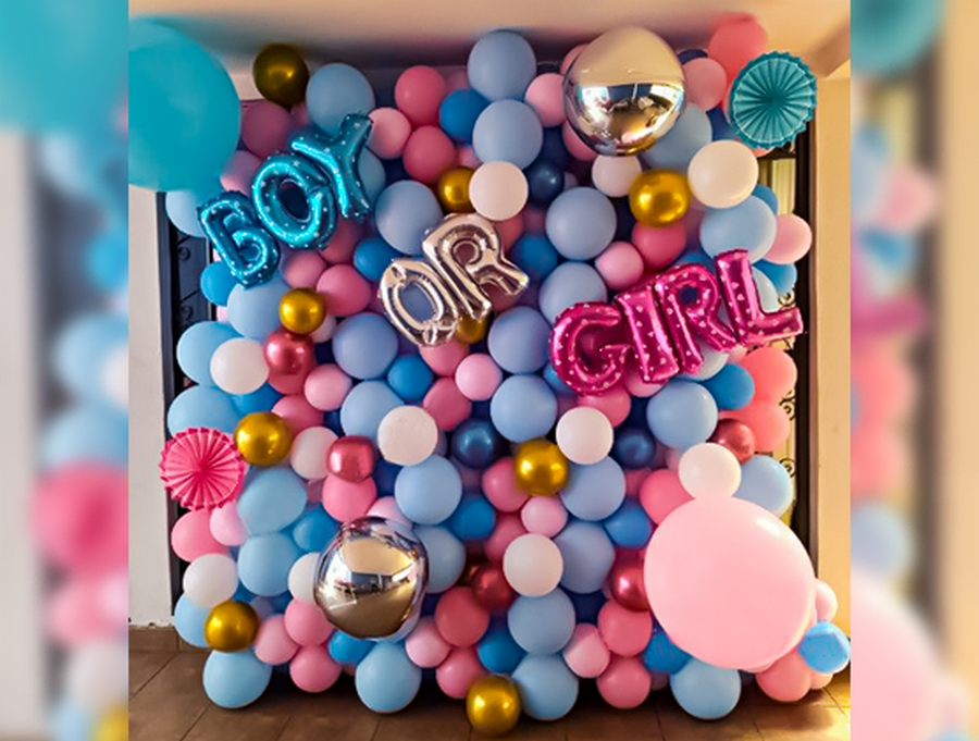Delightful Balloon Wall for gender reveal party