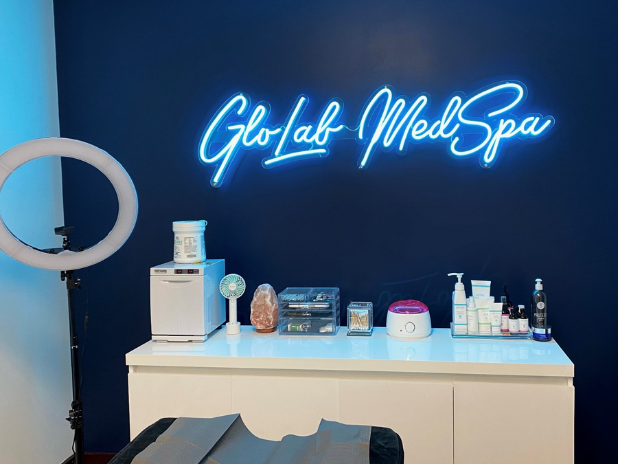 GloLab MedSpa neon sign in light blue