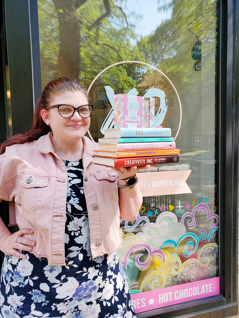 Kat Connor, co-founder of XO Marshmallow, shows off her favorite books for entrepreneurs 