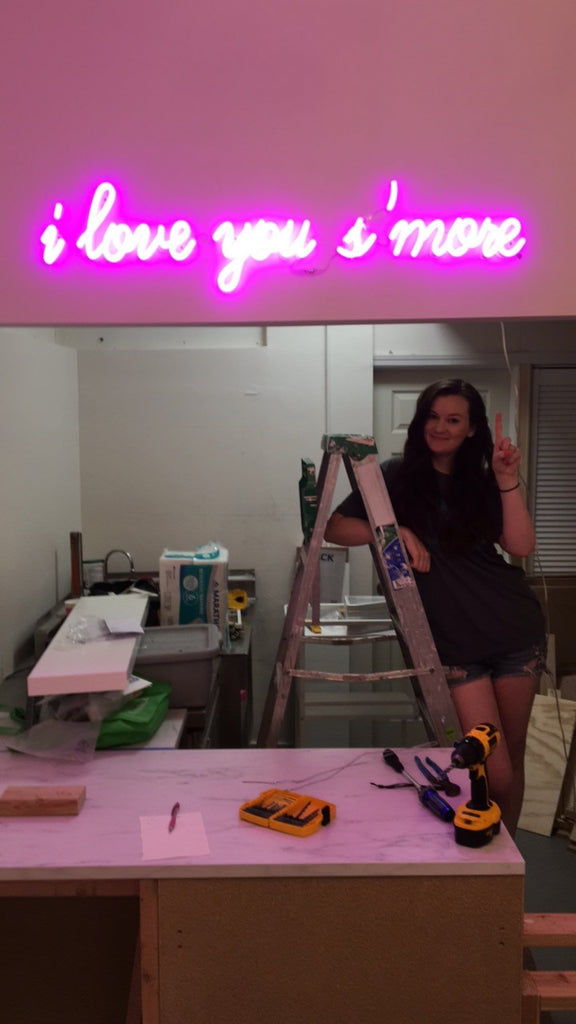 The "i love you s'more" neon sign goes in!