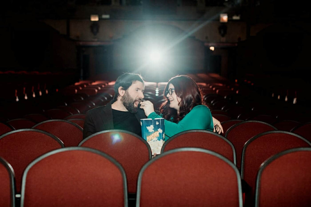 Kat Connor and her fiancé, Nick, enjoy popcorn in their favorite Chicago movie theatre, The Music Box