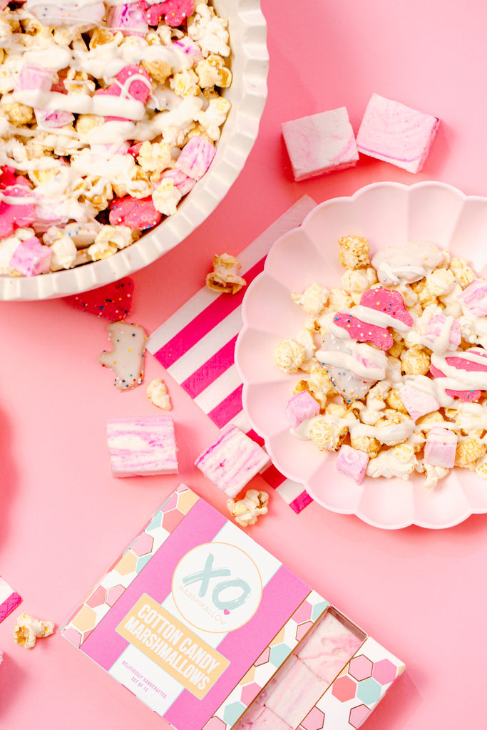 Cotton Candy Marshmallows, Frosted Animal Crackers, popcorn, white chocolate melted/drizzled on top