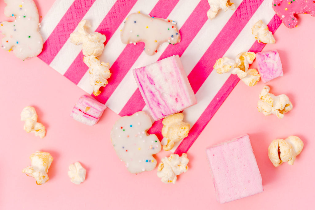 Cotton Candy Marshmallows, Frosted Animal Crackers, popcorn, white chocolate melted/drizzled on top