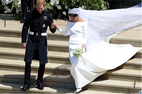 Prince Harry and Meghan Markel on the steps of St. Georges Windsor