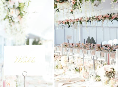 gold and pastel colours are the them for the table stationery at this wedding reception