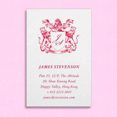 a portrait visiting card showing a family crest at the head and personal details below