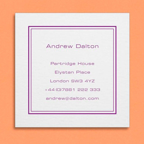 a square visiting card with an inset border and centred text