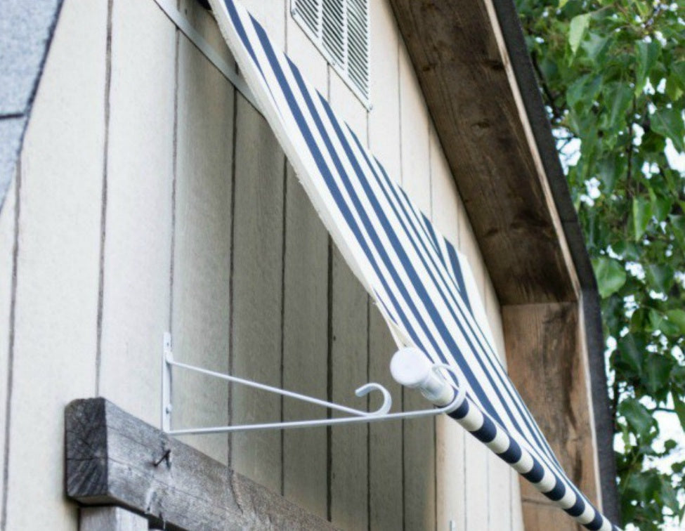 awning for barn made with curtain rod brackets