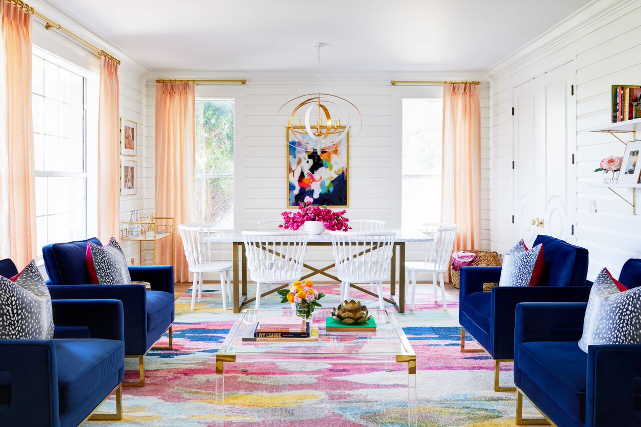 bright eclectic living room with pleated window dressing