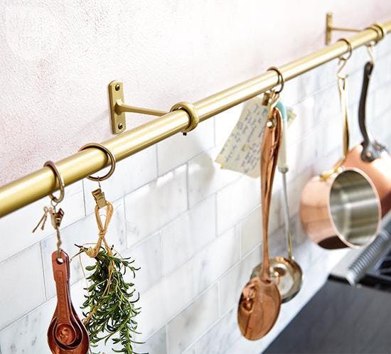 curtain rod and brackets for hanging kitchen utensils 