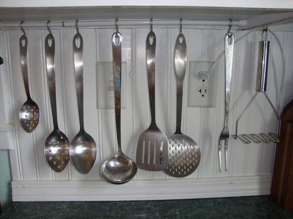 spring tension rod kitchen utensils
