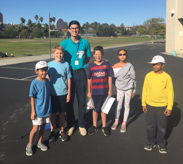 A golf-upgrades professional instructor teaching his students in San Diego