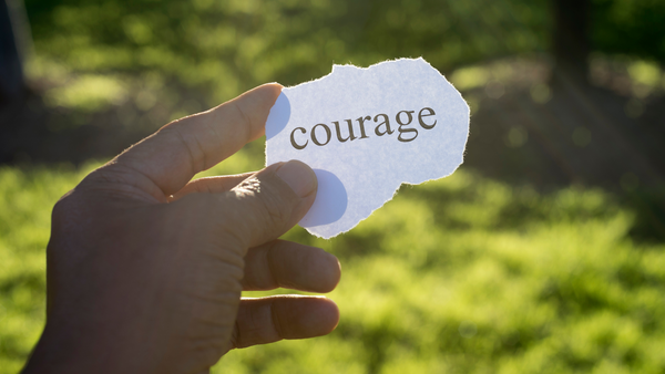 personal courage written on small note 