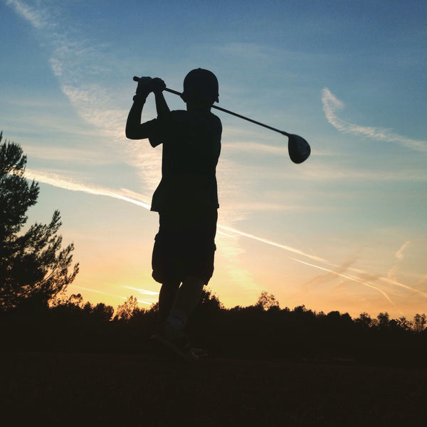 A golfer accepting his peace in the golf course