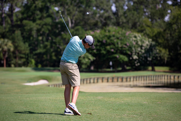 A golfer with knowledge of the fundamentals of a putting stroke using it to his advantage in the greens at San Diego