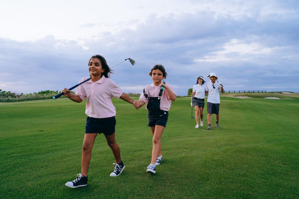 Children contented and prepared as they go on their way to their golf lessons in san diego