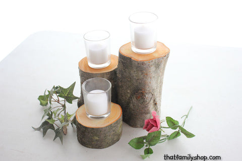 three logs on a table, centerpiece display candle holder