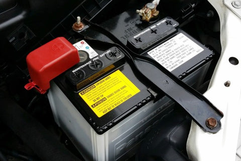 Close up of car battery showing that Bowen Taxi gives car boosts.