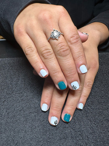 white and turquoise gel nails