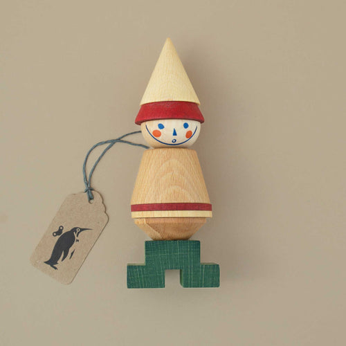 wooden-stick-figute-with-green-feet-and-red-hat