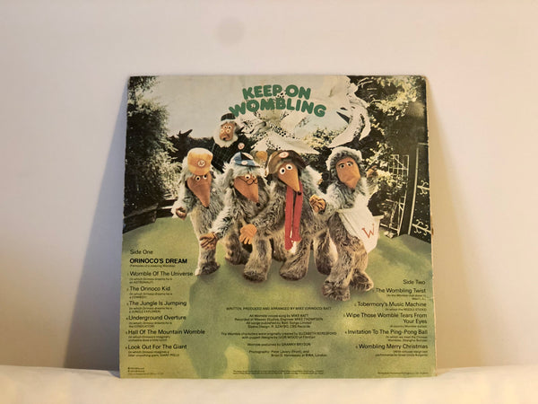 A photo of the back cover of the sleeve of a vinyl record of 'Keep On Wombling' by The Wombles.