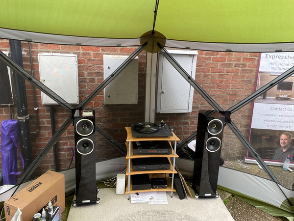 A photo of a HiFi system set up inside a gazebo tent.