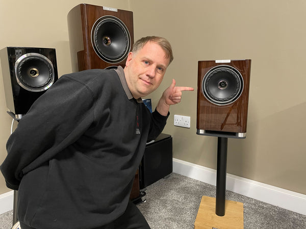 Expressive Audio General Manager John pointing at a Fyne Audio F700 Loudspeaker