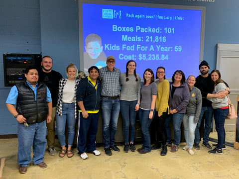 Everlast Climbing Staff volunteering at Feed My Starving Children