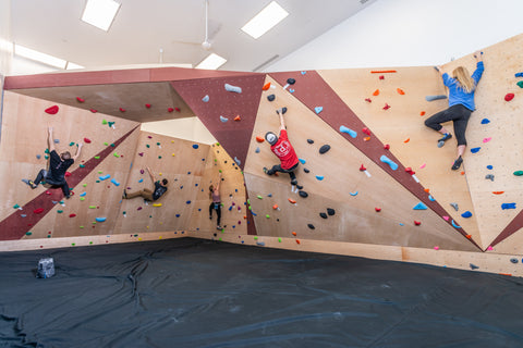 Climbers on a Kumiki Bouldering Wall