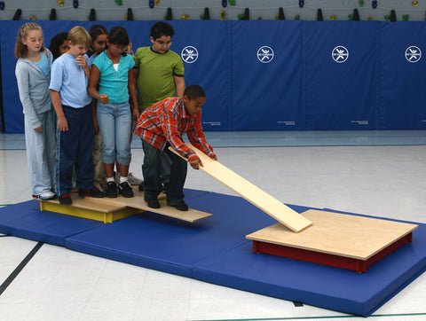 Children participating in the Sinking Raft Teambuilding challenge by Everlast Climbing