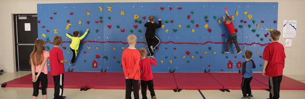 Up Down Relay Race on a Traverse Wall