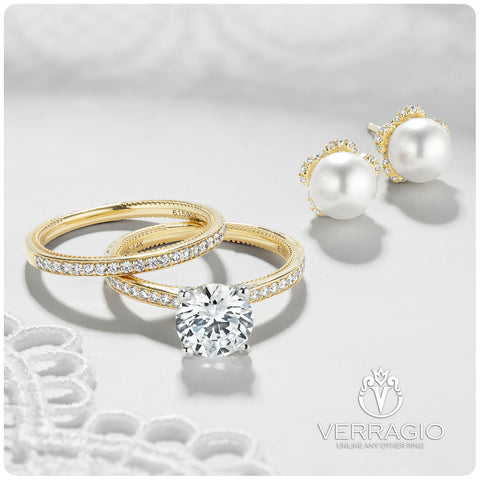 Yellow gold engagement ring and wedding band with matching pear earrings by verragio at Birmingham Jewelry