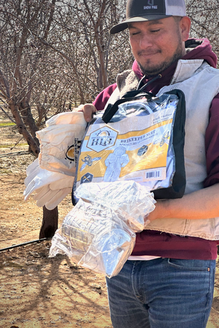 Commercial beekeeper with Harvest Lane Honey equipment