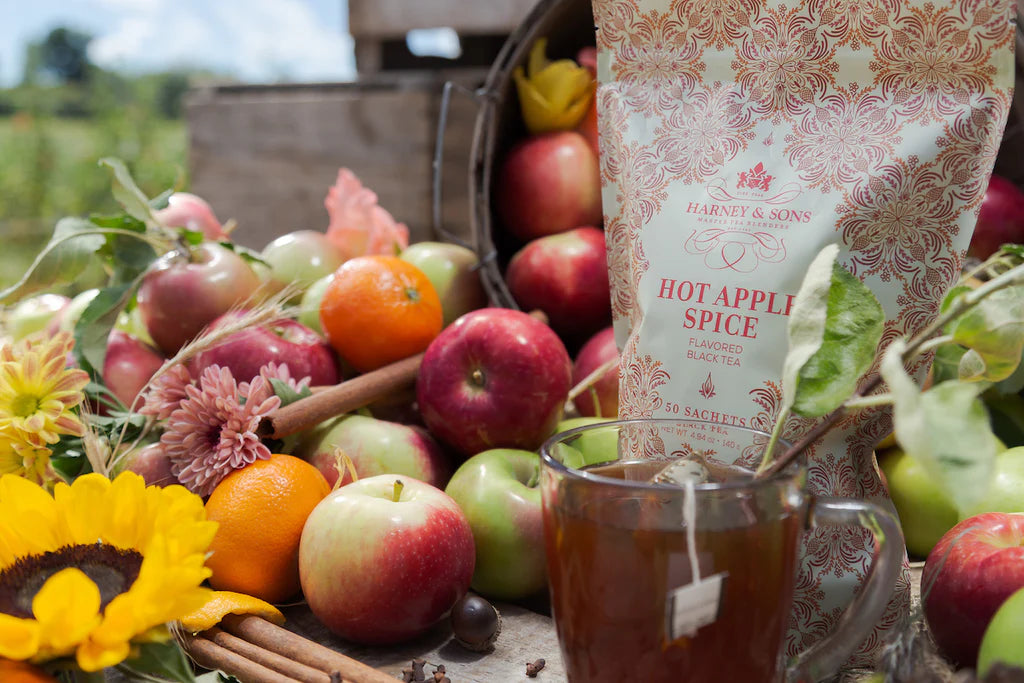 Hot Apple Spice  Fall’s other favorite round edible object, the apple, takes center stage in our Hot Apple Spice tea. This blend of black tea is bursting with apple pieces and flavor, cinnamon, orange peel and ground cloves. So fresh, you’ll swear we just picked it from the apple spice tree.