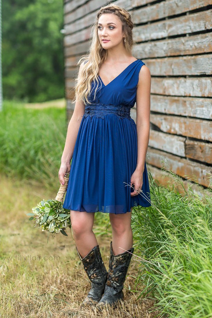 blue dress with cowboy boots