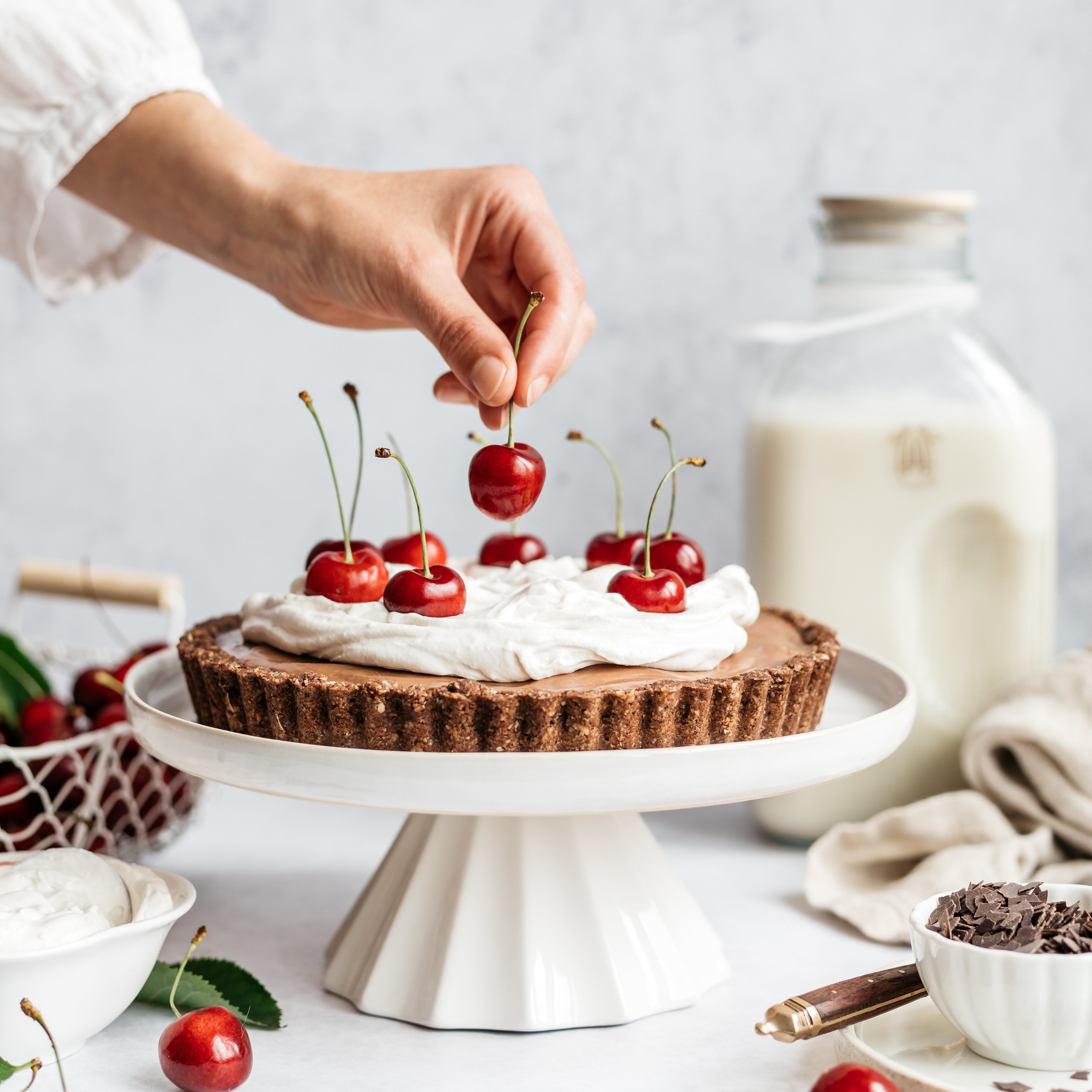 Black Forest Tart Chocolate Mousse Layer /></div>
<h2>Step 4 - Toppings</h2>
<p>Whip the cream - add the cream stiffener and vanilla sugar if needed.</p>
<p>Top the tart with whipped cream, fresh cherries (with stem) and chocolate shavings.</p>
<img src=