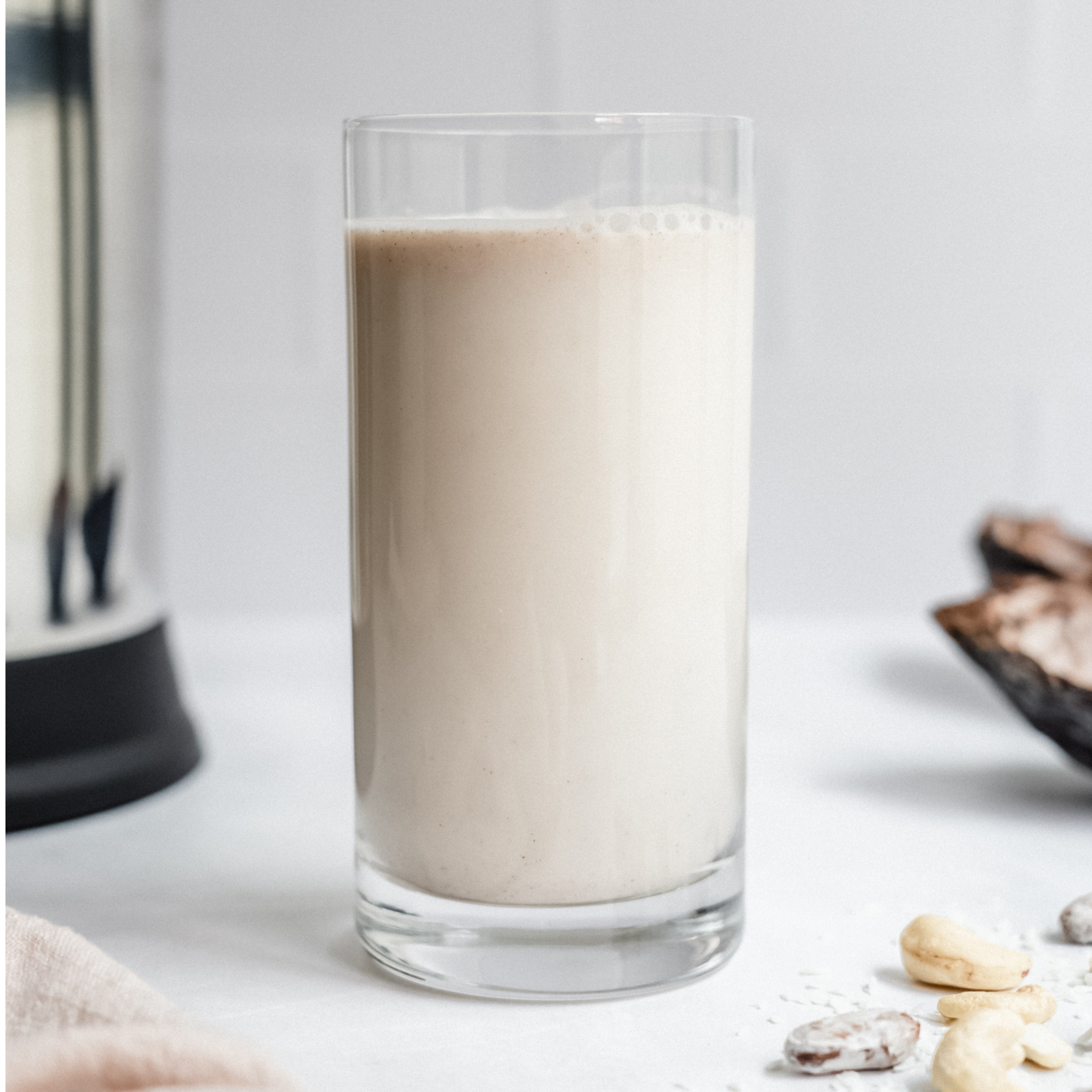 CocoCash Cacao Milk in a glass