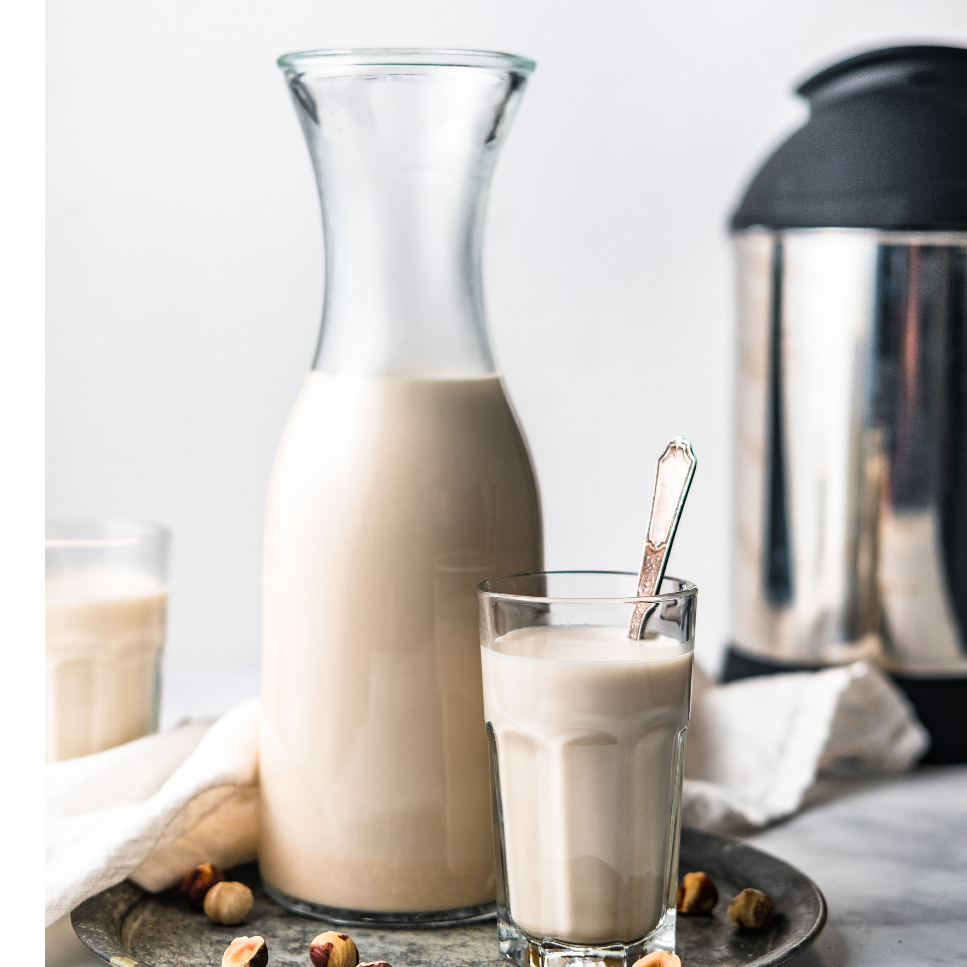 a jug and glass of Hazelnut Milk