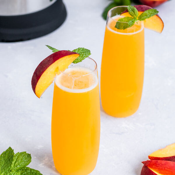 Peach Bellinis made with an almond cow