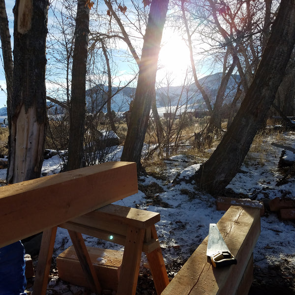 Handsawing timber framing at Sweet Belly Farm in Salmon, ID