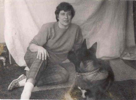 Jean (Dills) Blue Anita's Sister Jean with her dog, a Japanese Akita sometime in the late 1950's or early 1960's