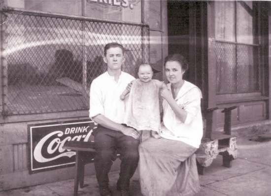 Clyde when he was one year of age with his father, John Clyde Harbin Sr. and mother