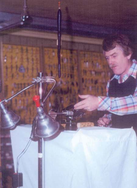 Carl F. Luckey setting up his light tent to start photographing lures from Mr. Clyde A. Harbin Sr. (The Bassman) collection for the first edition of the Value Guide Book in Early 1979