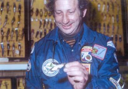 Seth Rosembaum on a visit to the Bassman's lure room comparing his first 1903 Dowagiac Underwater (tail rudder) lure with Mr. Harbin's lure from Dowagiac.  This was not known as of April 14, 1979 for the Reelfoot Antique Lure NFLCC Fishing Tournament.