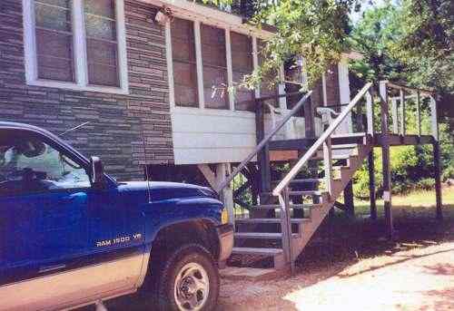 In the spring of 2000 these front steps and porch were built to make it easier to enter the cabin with supplies for Mr. Harbin because of his recent right hip replacement.  It also proved to be a beautiful spot to watch feeding birds and raccoons.