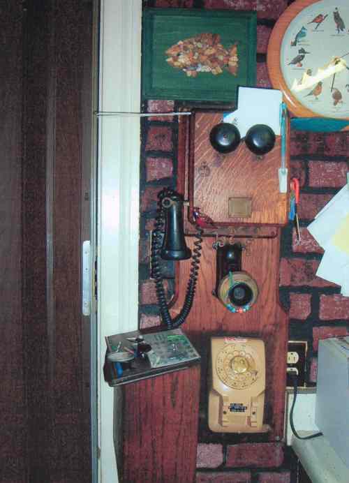 Charles Lewis completely re-wired the ear and mouth pieces while installing this rotary phone upside down so it could be used.  This 5 magnet old phone rings every day in the kitchen of their home in Memphis, Tennessee.