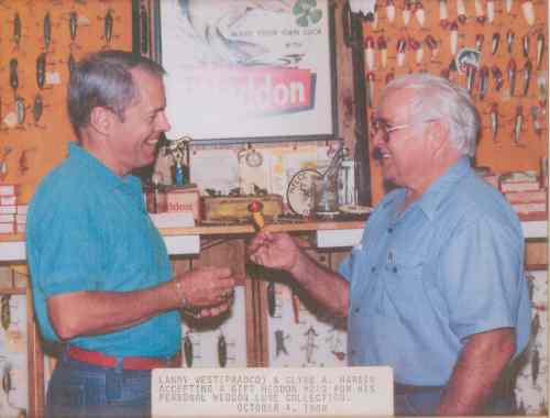 Lanny West accepting a gift Heddon #210 for his personal Heddon lure collection from Mr. Clyde A. Harbin on October 4, 1988.  As of August 1, 2003 Lanny West is now the Senior Director of Marketring and International Sales, PRADCO Outdoor Brands of Ft. Smith, Arkansas.  Also on page #381 of The Heddon Historical Footprints Book.