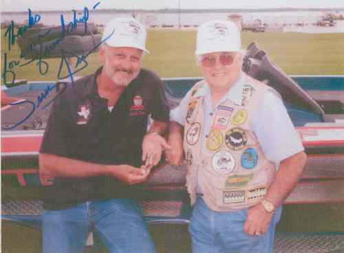 Jerry Dean & Clyde A. Harbin, Sr. after shooting a segment on "Old Texas Lures" for the Honey Hole TV Magazine in Lake Fork, Alba, Texas on April 25, 1991.  Jerry is holding a small Livingston Hinckley "Phantom Float" made out of aluminum that is marked January 12, 1897.