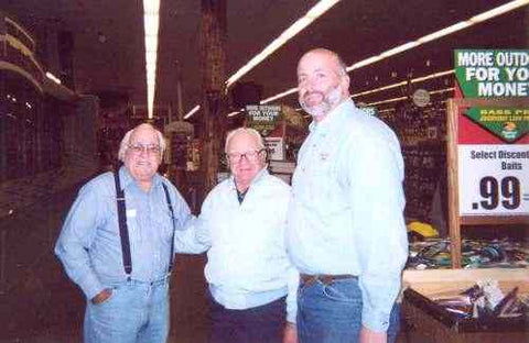 Left to Right - Clyde A. Harbin, Charles Zside, Rick Collins    Clyde just by chance met his long lost friend Charles at the lure collection and Bass Pro Shops Fish Tank.